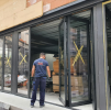 FERMETURE DE FACADE DE 8 M DE LARGE SUR 3M DE HAUT EN ALUMINIUM  - LOFT A VILLEURBANNE