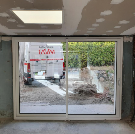 TRANSFORMATION D’UN GARAGE EN PIÈCE À VIVRE AVEC UN COULISSANT - ST PRIEST TRANSFORMATION D’UN GARAGE EN PIÈCE À VIVRE AVEC UN COULISSANT - ST PRIEST